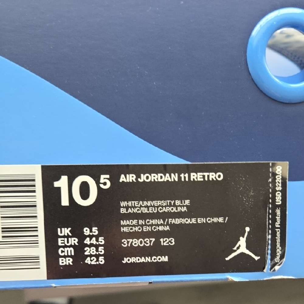 Air Jordan 11 Retro - White and University Blue